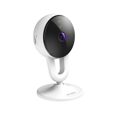 White security camera with black lens on a white background